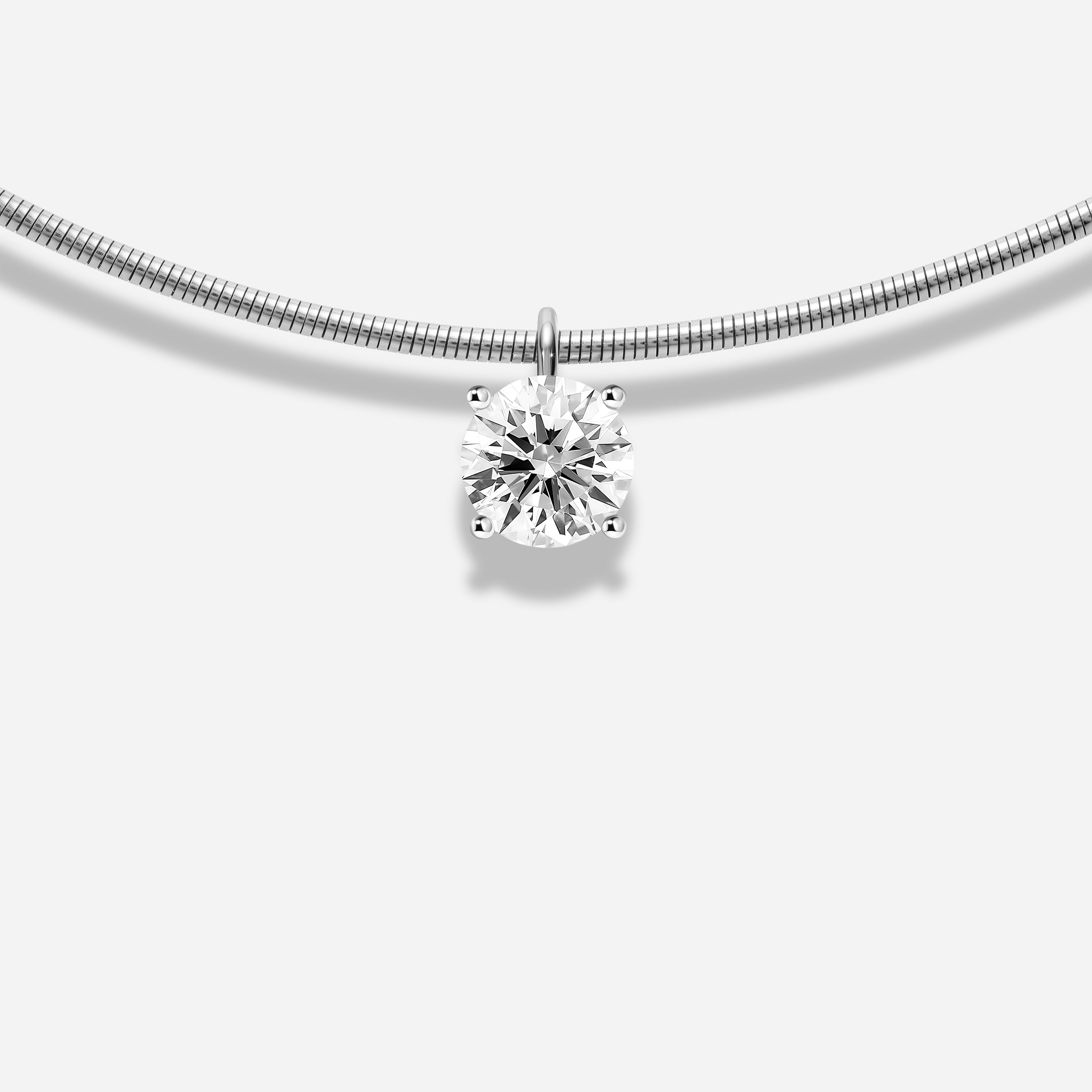 18K GOLD ROUND BRILLIANT CUT DIAMOND