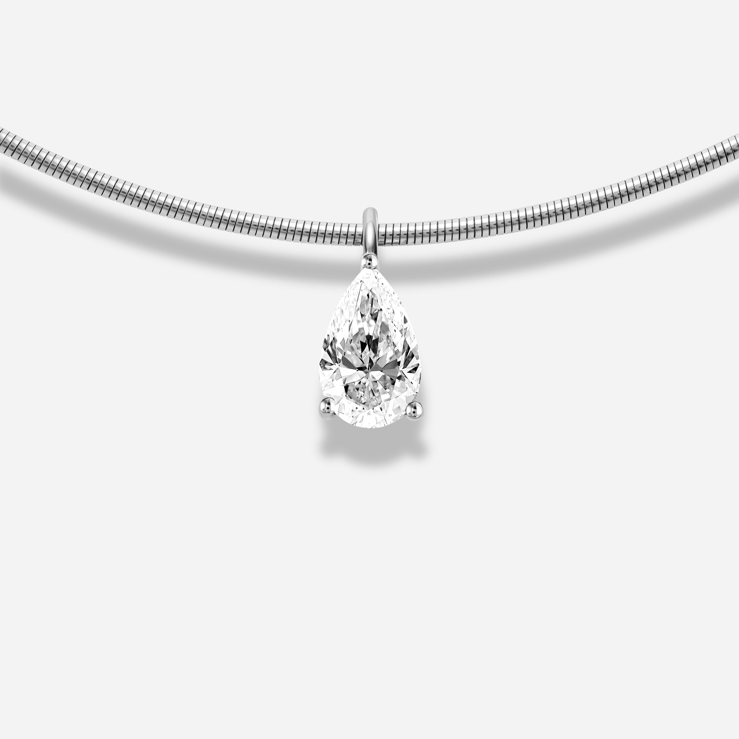 18K GOLD PEAR SHAPE DIAMOND