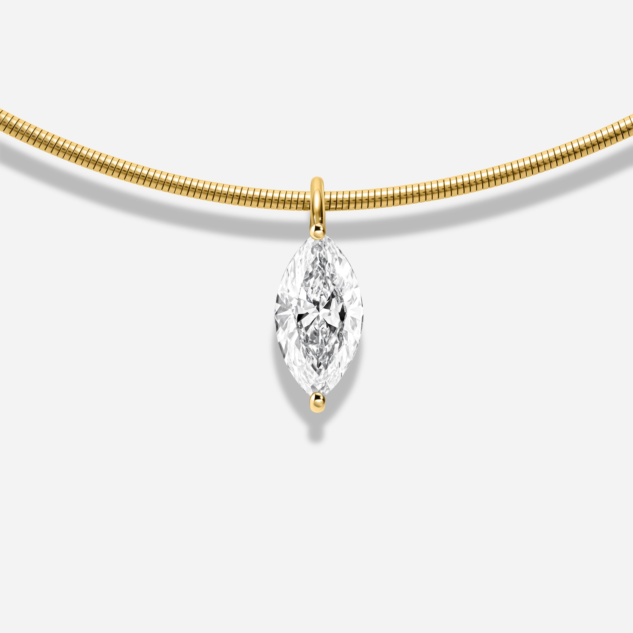 18K GOLD MARQUISE CUT DIAMOND