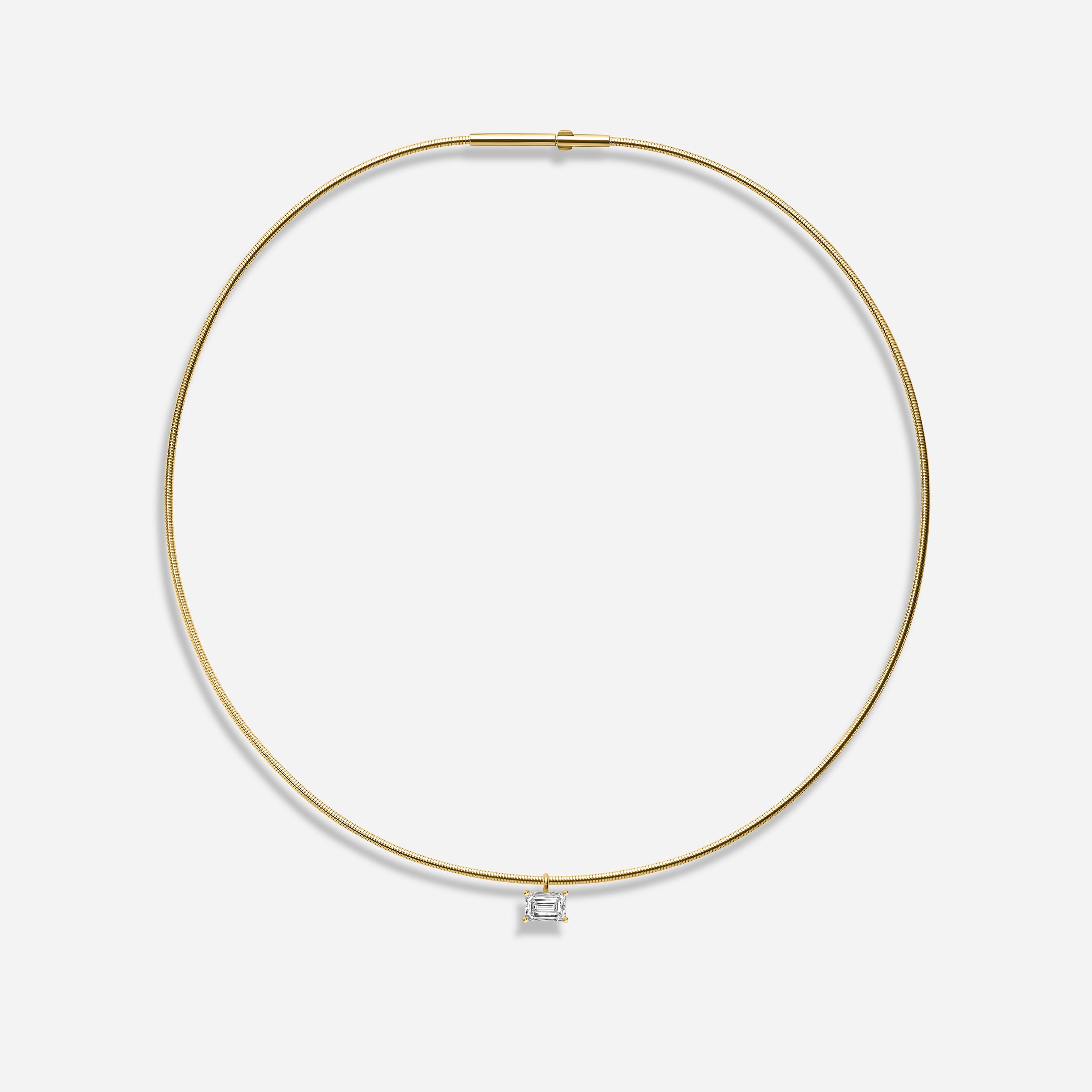 18K GOLD EMERALD EAST WEST DIAMOND