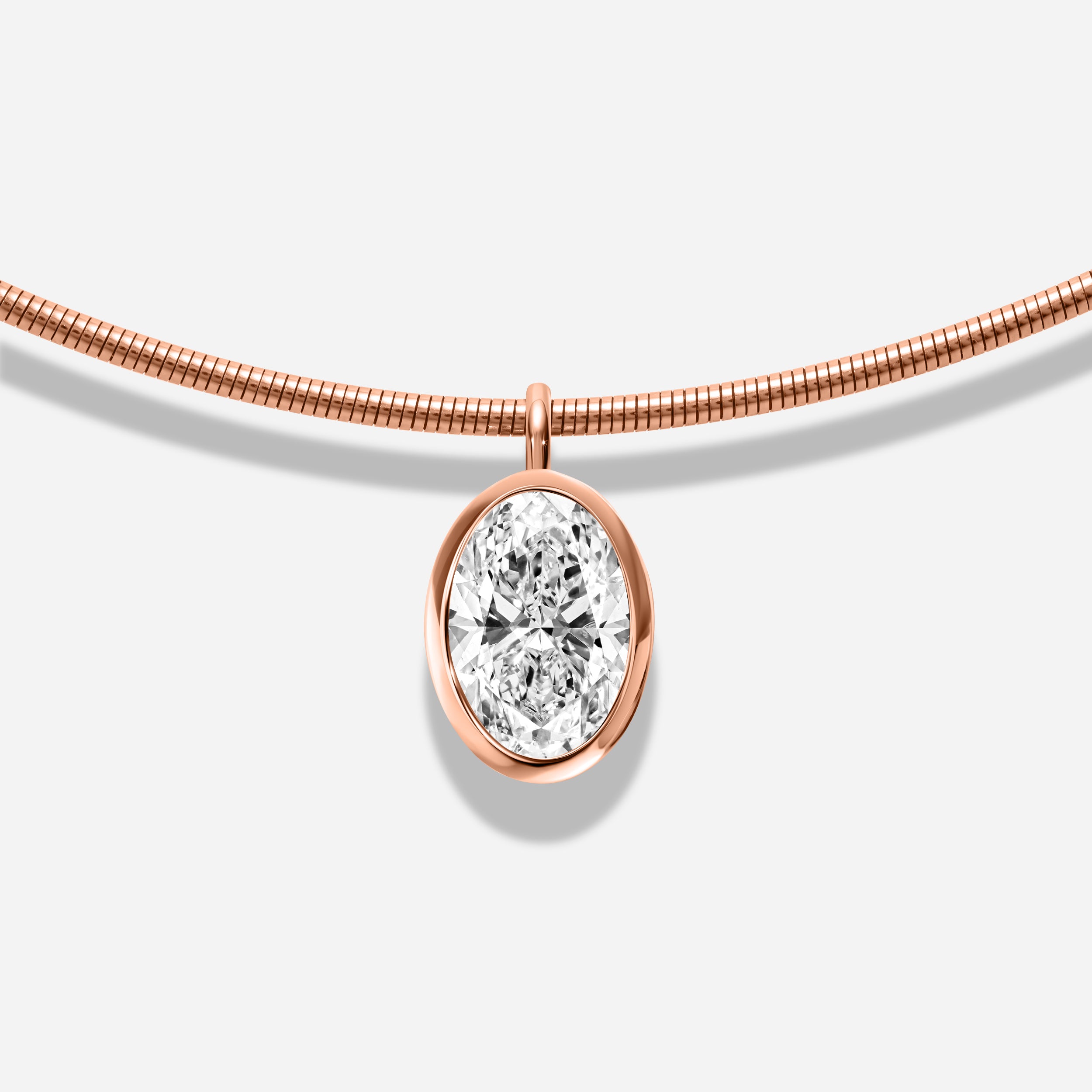 18k GOLD OVAL BEZEL DIAMOND