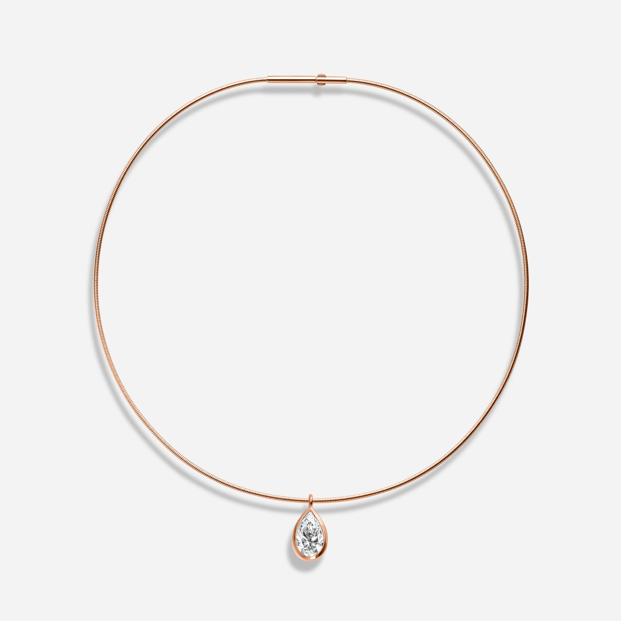 18k GOLD PEAR SHAPE BEZEL DIAMOND