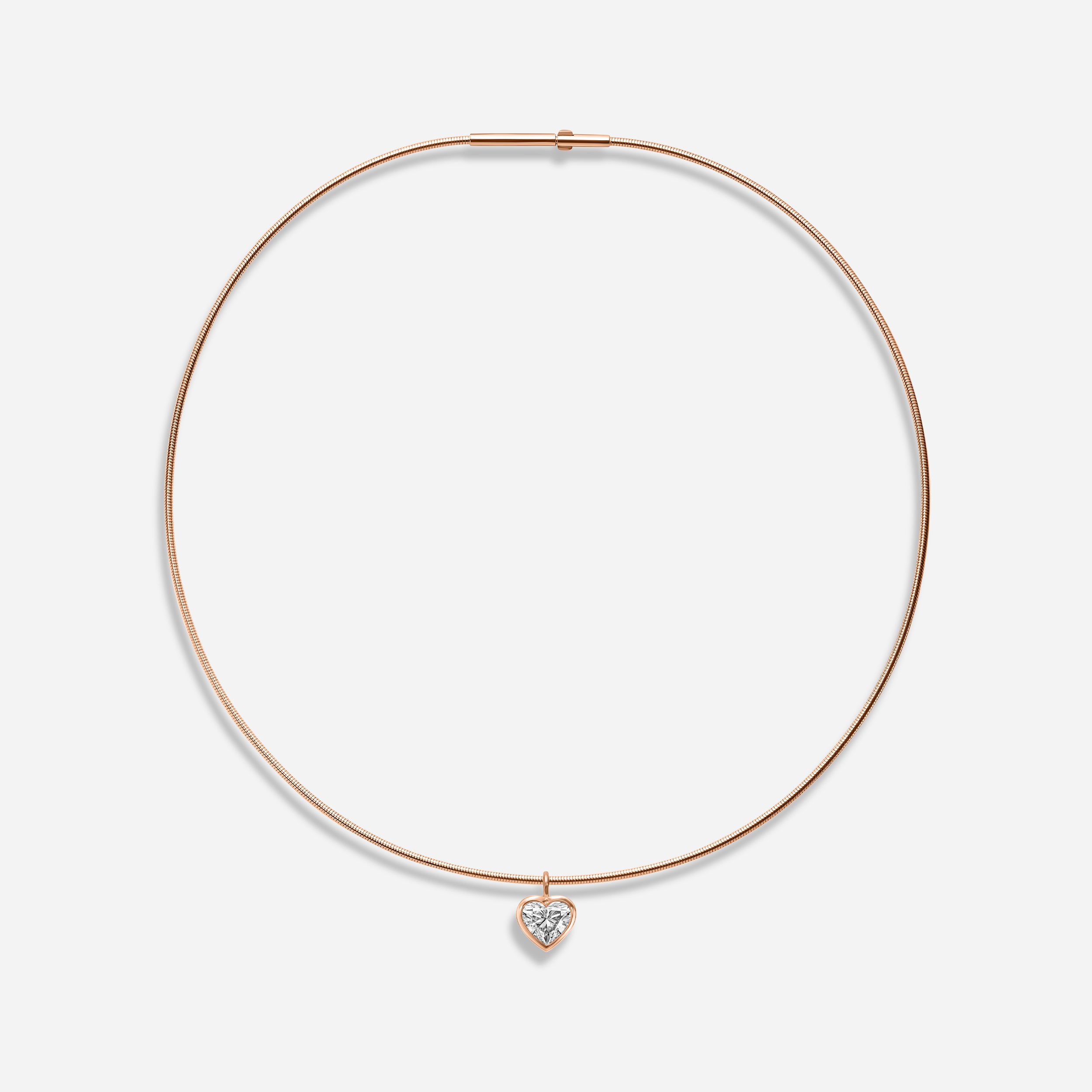 18k GOLD HEART SHAPE BEZEL DIAMOND