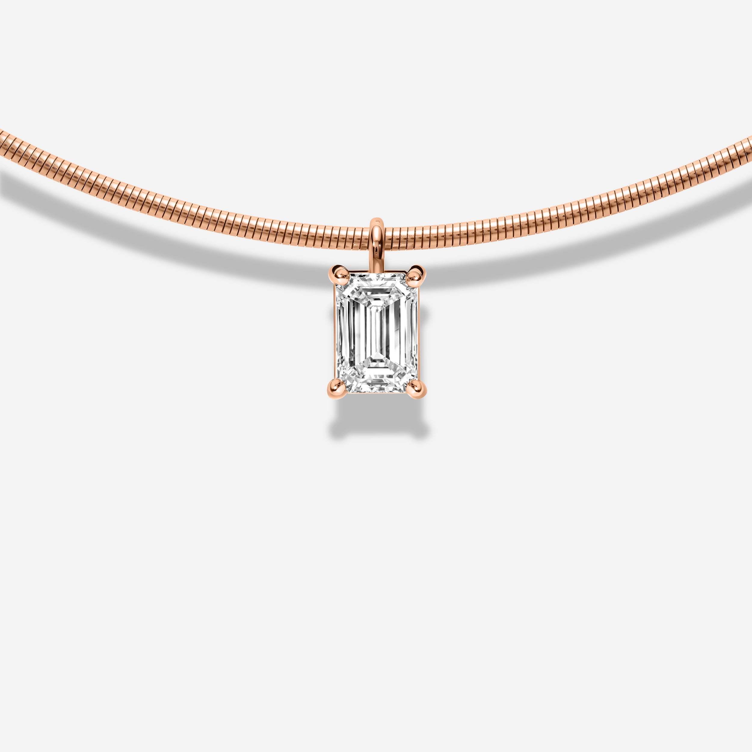 18K GOLD EMERALD CUT DIAMOND