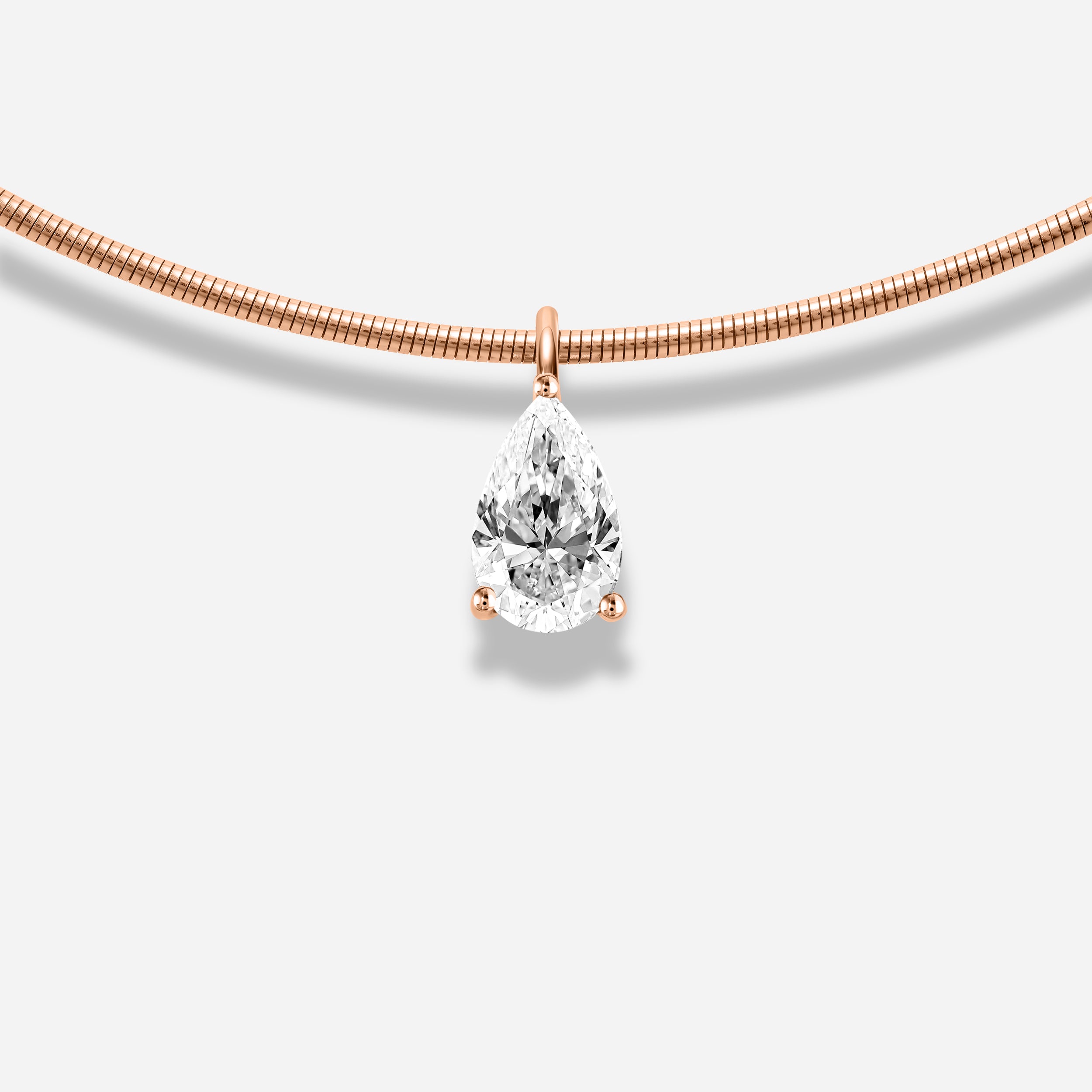 18K GOLD PEAR SHAPE DIAMOND