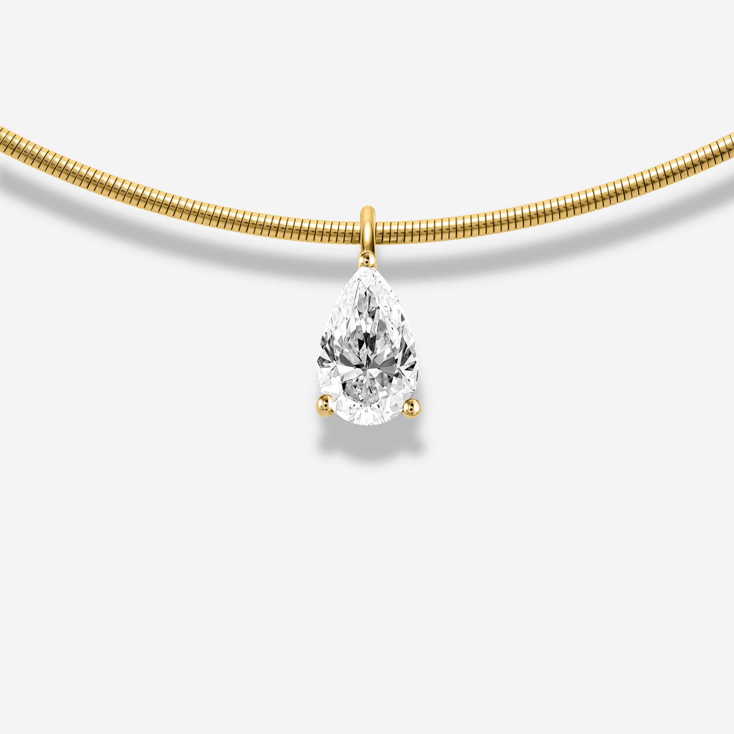 18K GOLD PEAR SHAPE DIAMOND
