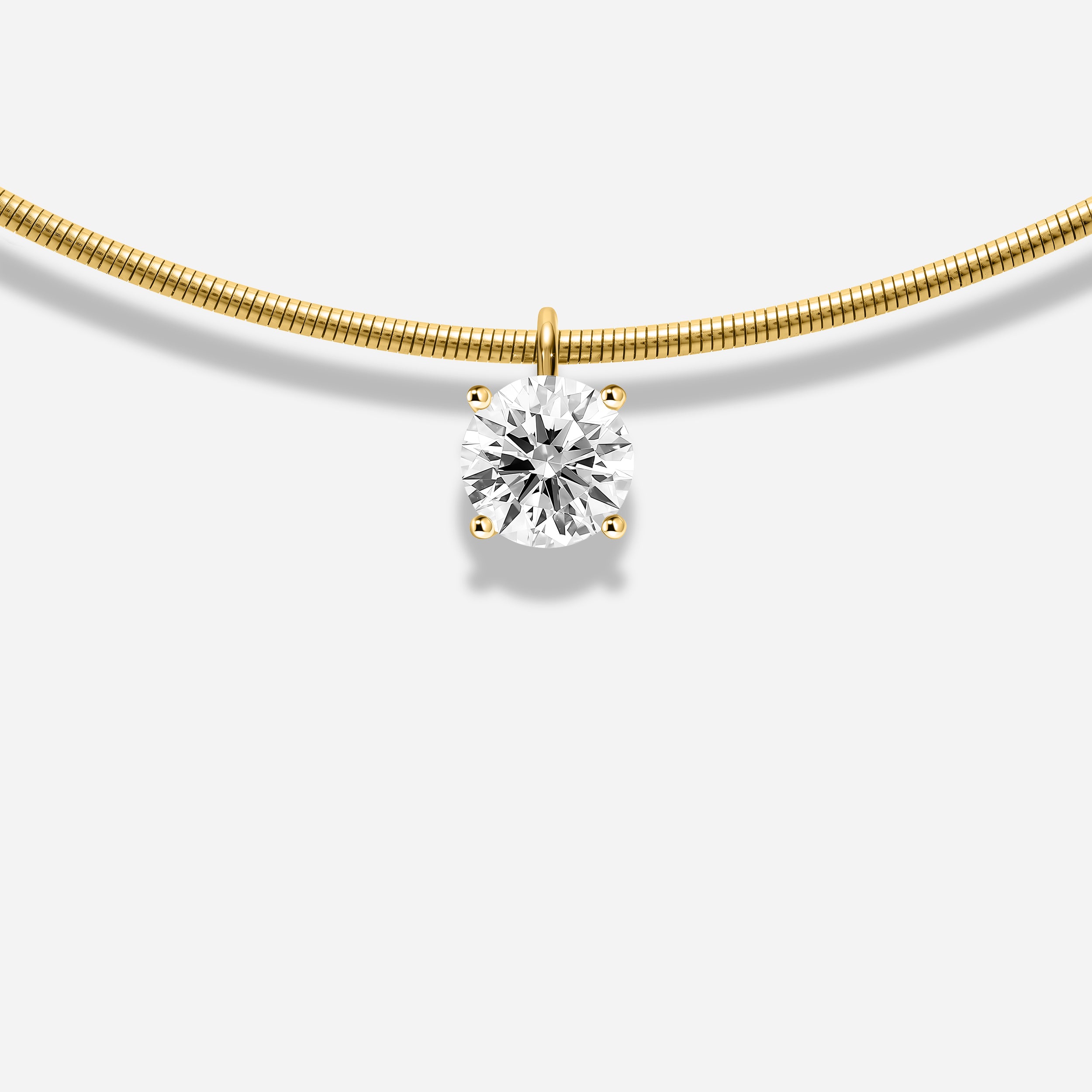 18K GOLD ROUND BRILLIANT CUT DIAMOND