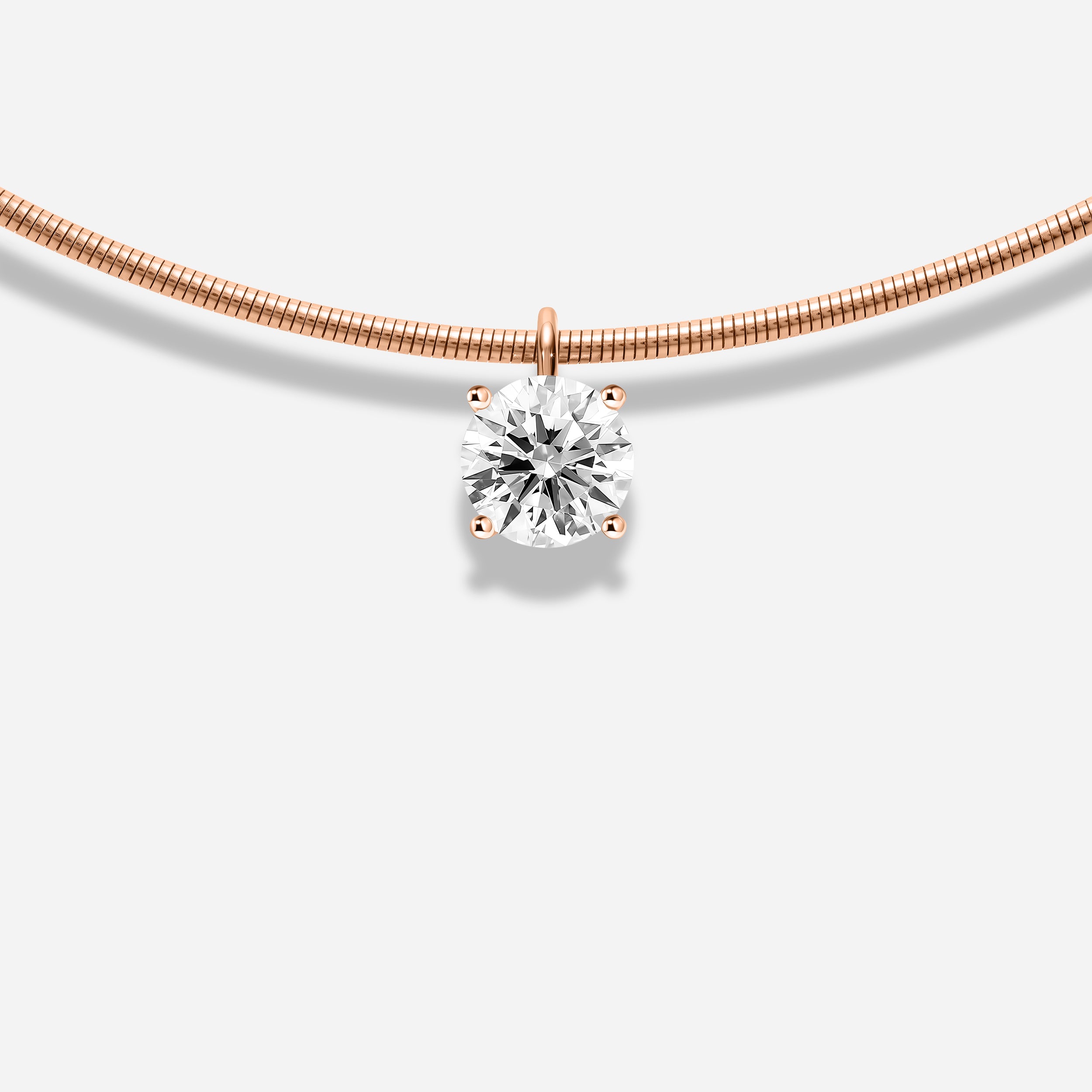18K GOLD ROUND BRILLIANT CUT DIAMOND