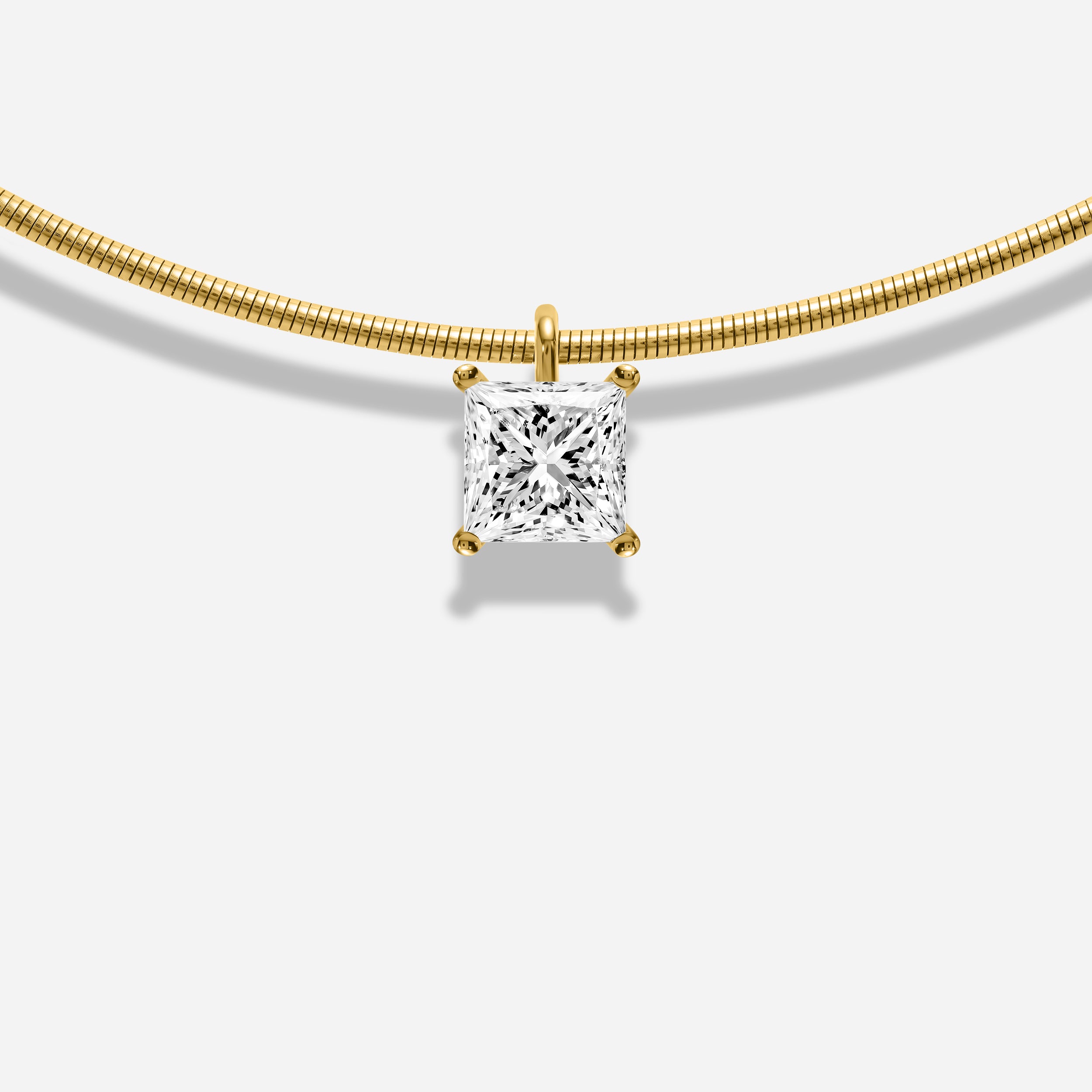 18K GOLD PRINCESS CUT DIAMOND