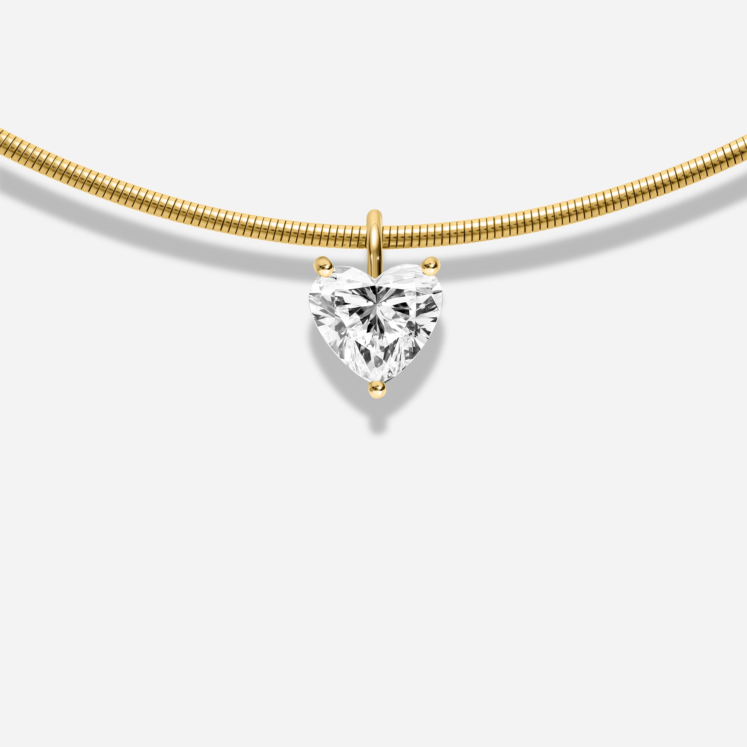 18K GOLD HEART SHAPE DIAMOND