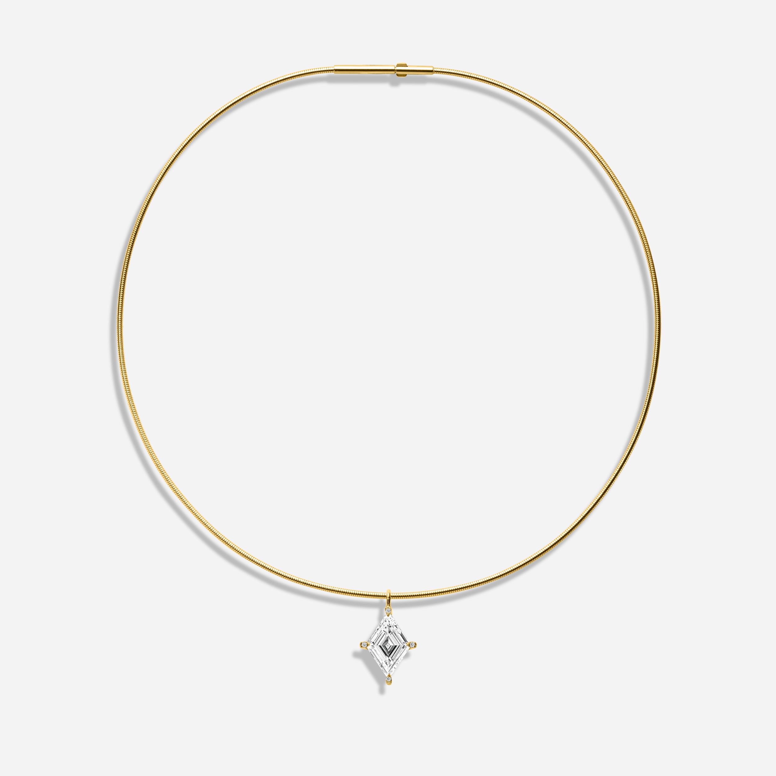 18k GOLD LOZENGE CUT DIAMOND