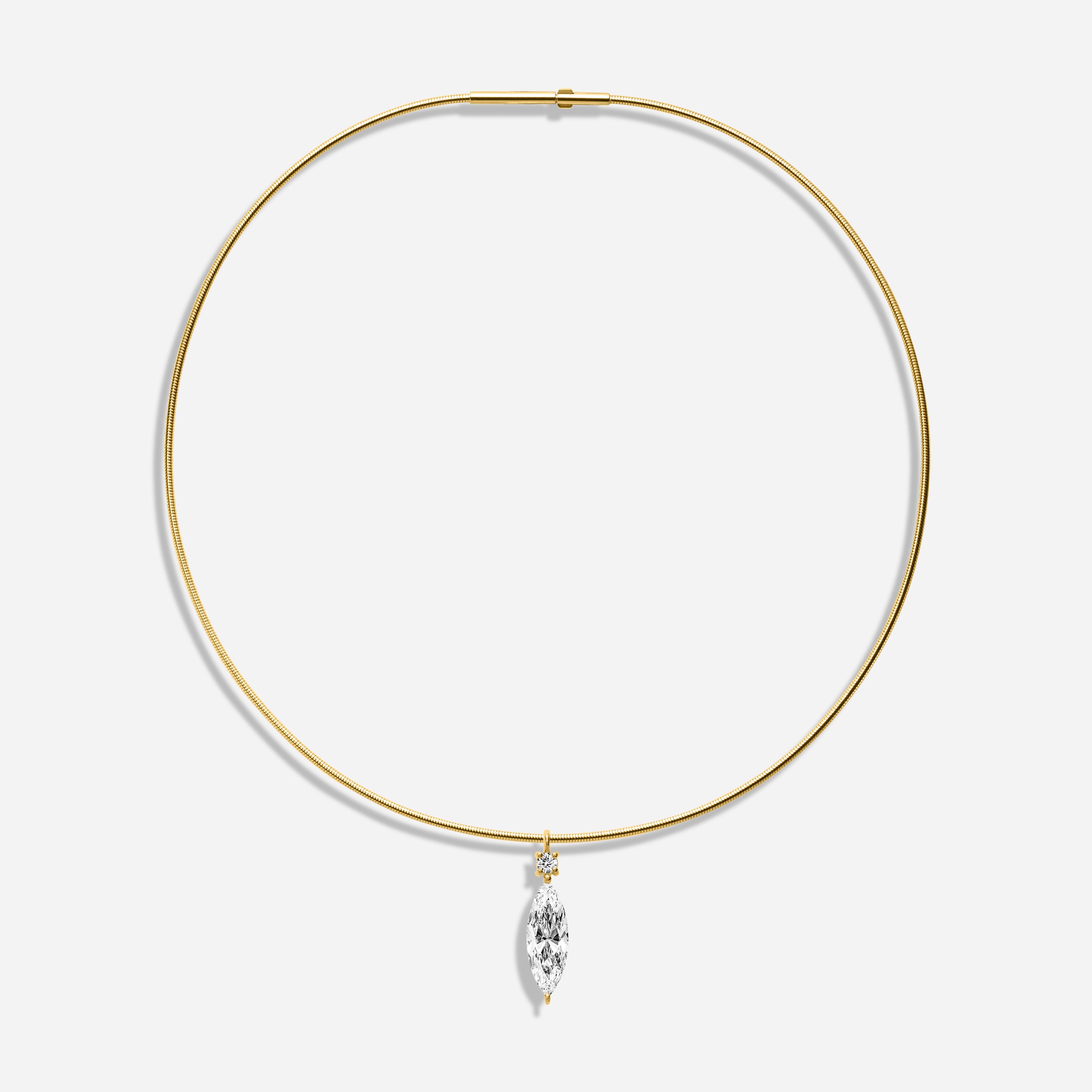 18k GOLD MARQUISE AND ROUND SHAPE DIAMOND