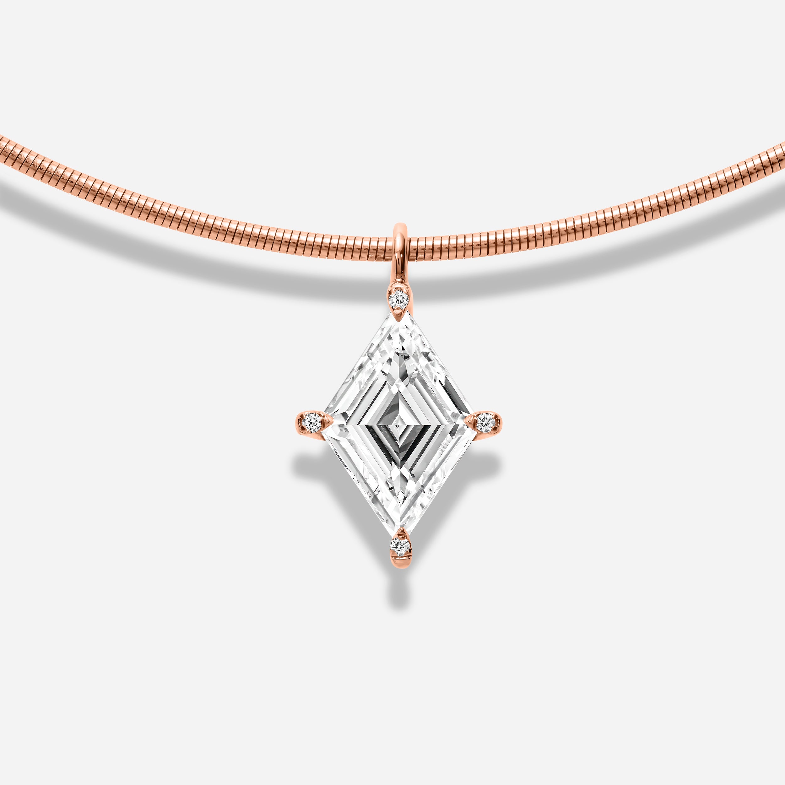 18k GOLD LOZENGE CUT DIAMOND