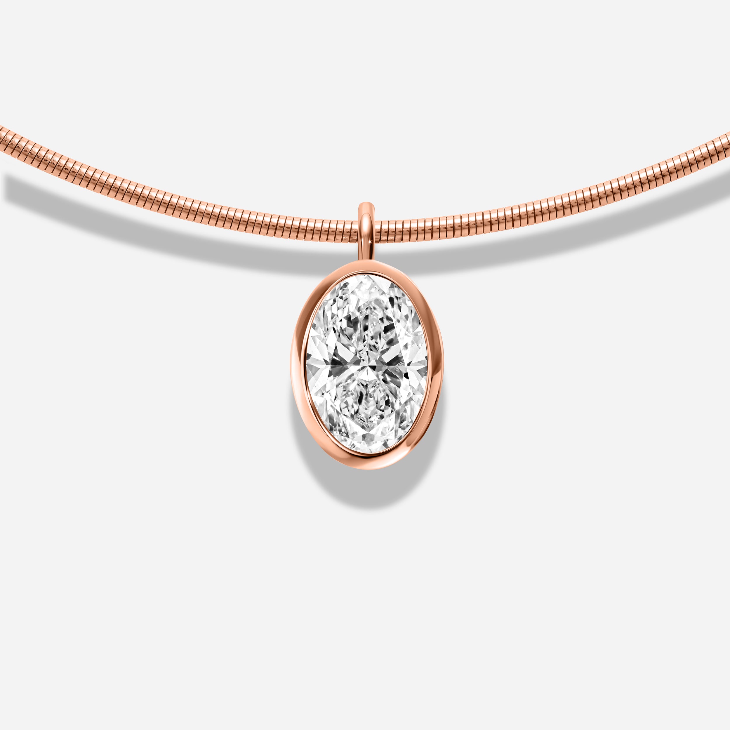 18k GOLD OVAL BEZEL DIAMOND