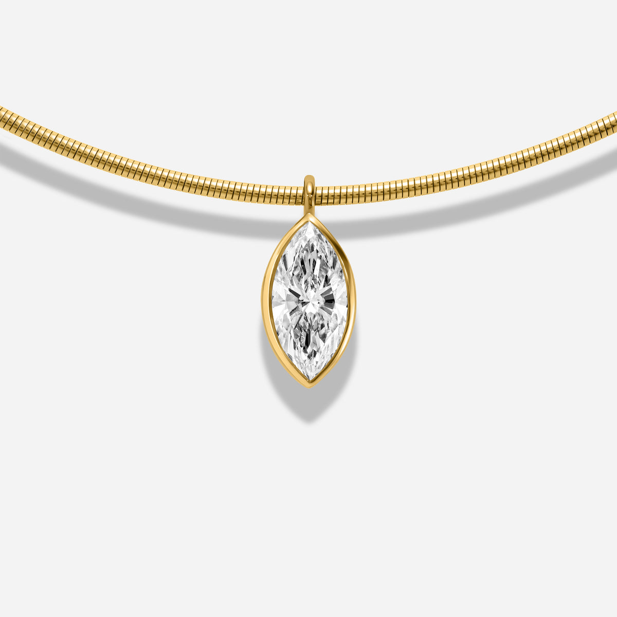 18k GOLD MARQUISE BEZEL DIAMOND
