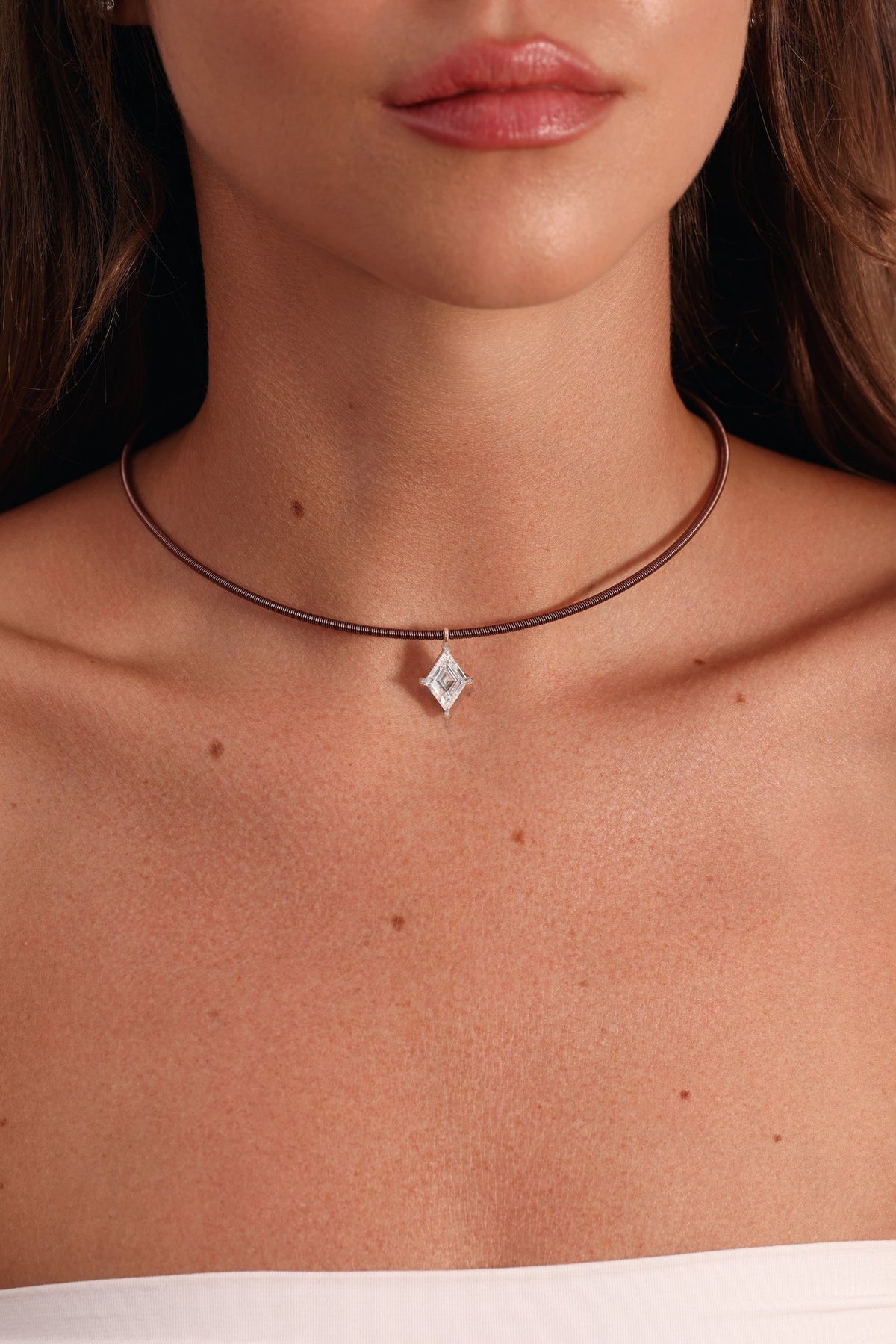 18k GOLD LOZENGE CUT DIAMOND
